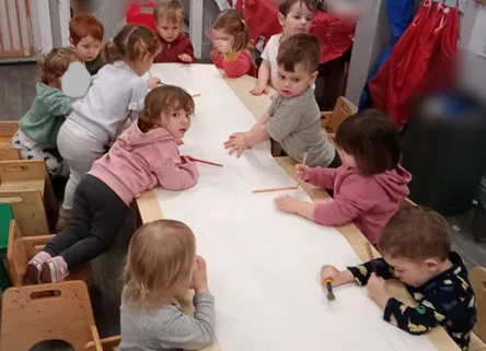 Children working as a team, sharing ideas. 
